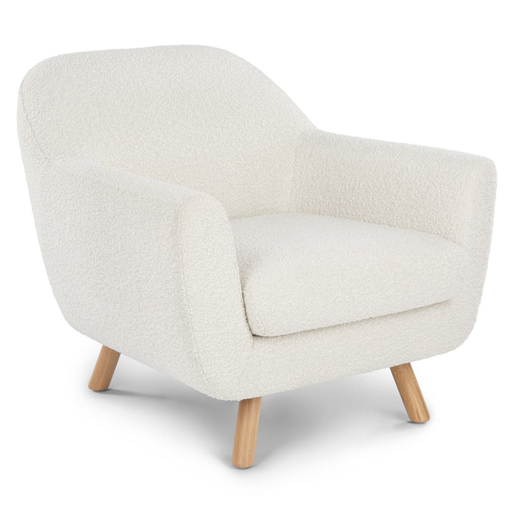 Santorini bouclé lounge chair in emerald green with curved wood frame in modern living room