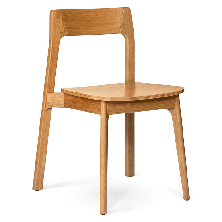 Selene Dining Chairs in a modern dining room with bentwood design and stackable feature