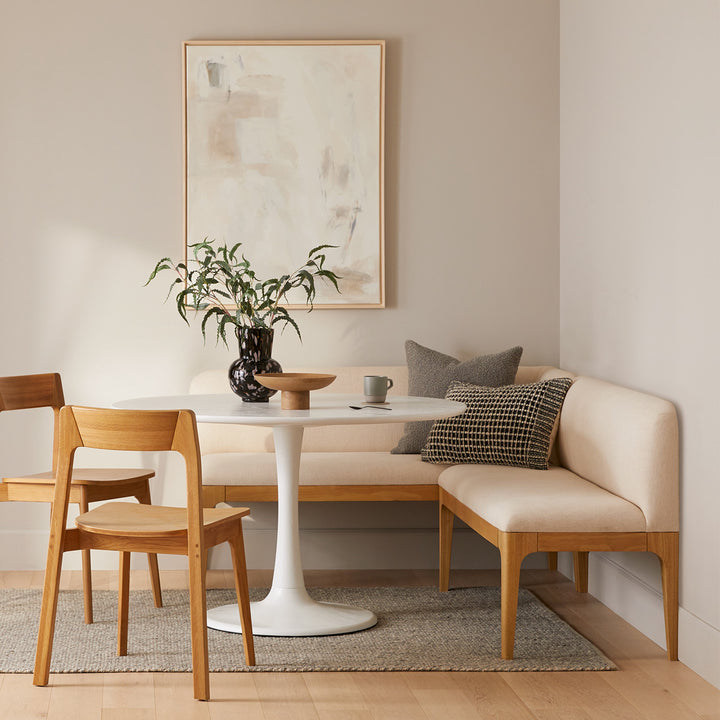 Silvanus Hand-Woven Wool Rug in a bohemian living room with wood floors and neutral decor