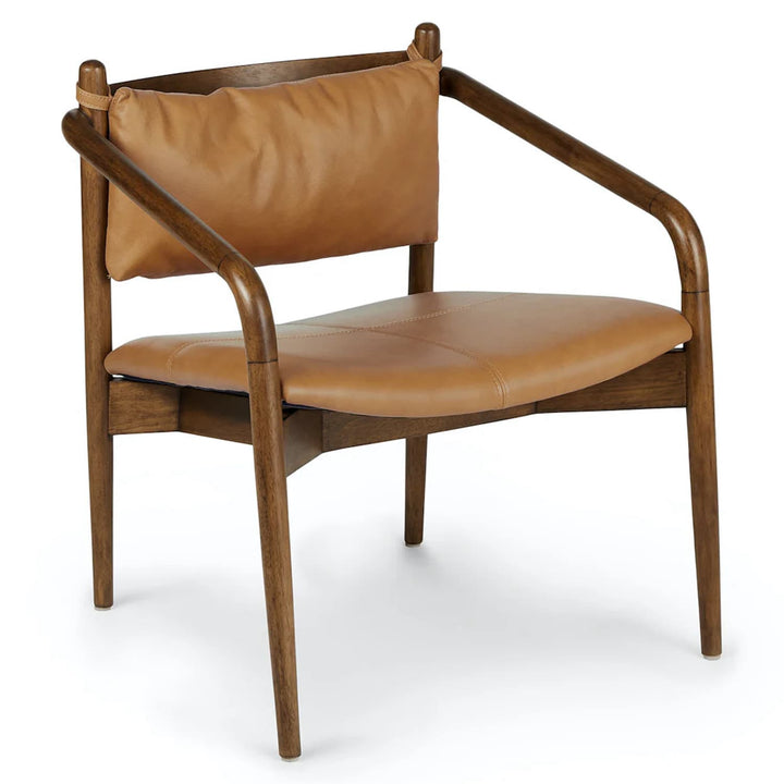 Solstice Leather Lounge Chair in tan patina leather with walnut legs in mid-century living room