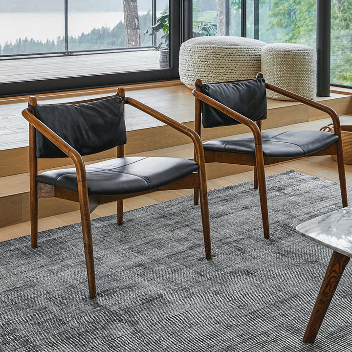 Solstice Leather Lounge Chair in tan patina leather with walnut legs in mid-century living room