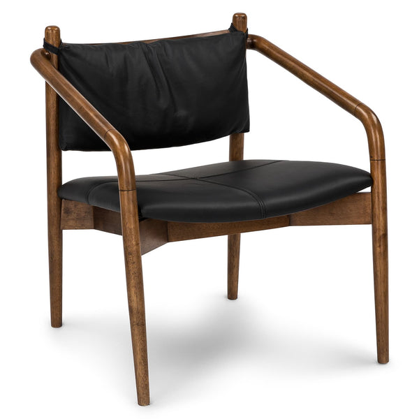 Solstice Leather Lounge Chair in tan patina leather with walnut legs in mid-century living room