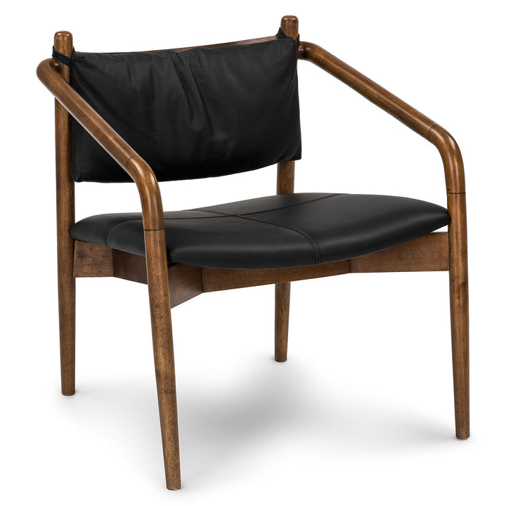 Solstice Leather Lounge Chair in tan patina leather with walnut legs in mid-century living room