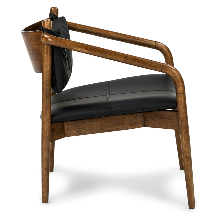 Solstice Leather Lounge Chair in tan patina leather with walnut legs in mid-century living room