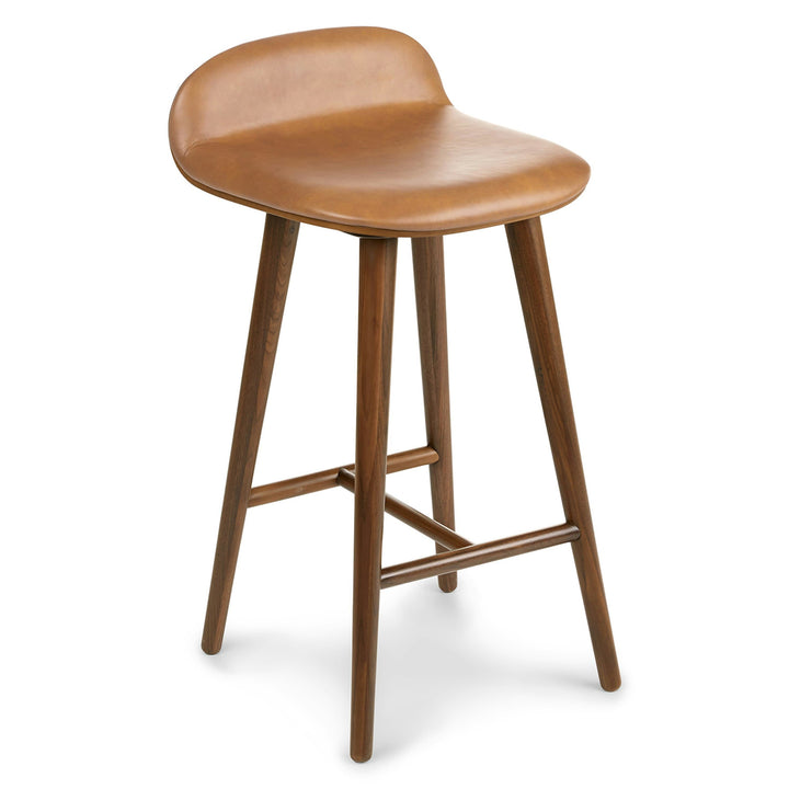 Stria Leather Counter Stool in a mid-century modern kitchen with tapered legs and Toscana leather seat