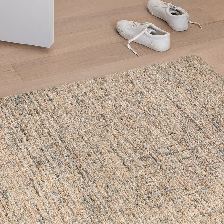 Tavola 8' x 10' Wool Rug in a mid-century modern living room with space-dyed wool texture