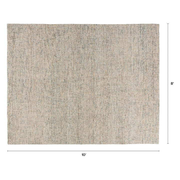 Tavola 8' x 10' Wool Rug in a mid-century modern living room with space-dyed wool texture