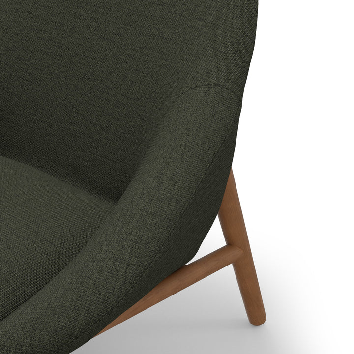 Thalassa Lounge Chair with solid oak dowels and yarn-dyed gray fabric in a minimalist living room setting