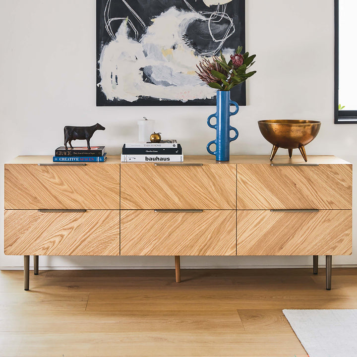 Thalia 6-Drawer Low Triple Dresser in a mid-century modern bedroom with soft-close drawers