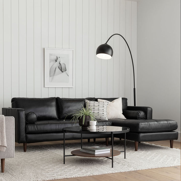 Vega Floor Lamp in a modern living room with crescent arc and marble base