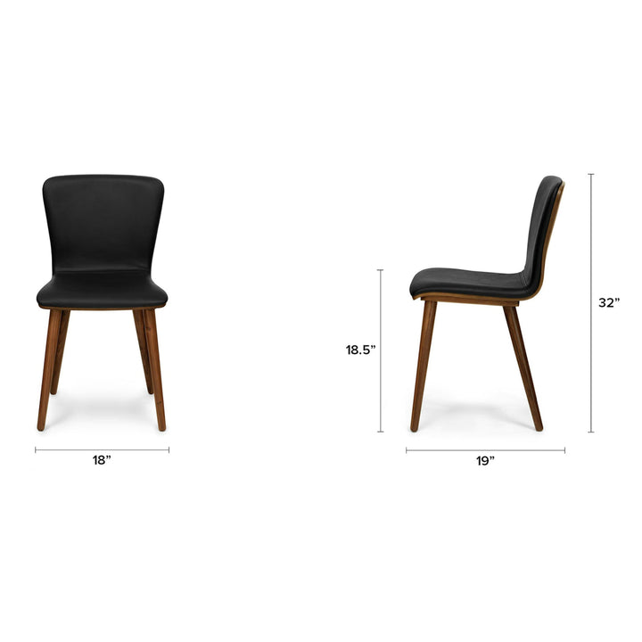 Vela Dining Chairs in a mid-century modern dining room with Toscana leather and tapered legs