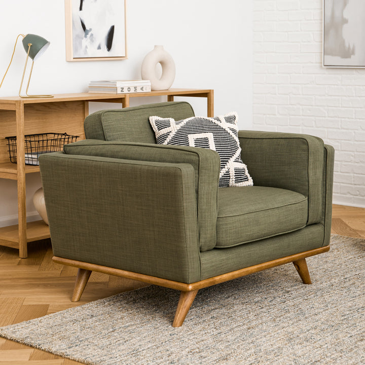Ventura Lounge Chair in oat bouclé fabric with plush cushions, placed by a sunny window with coffee mug on side table