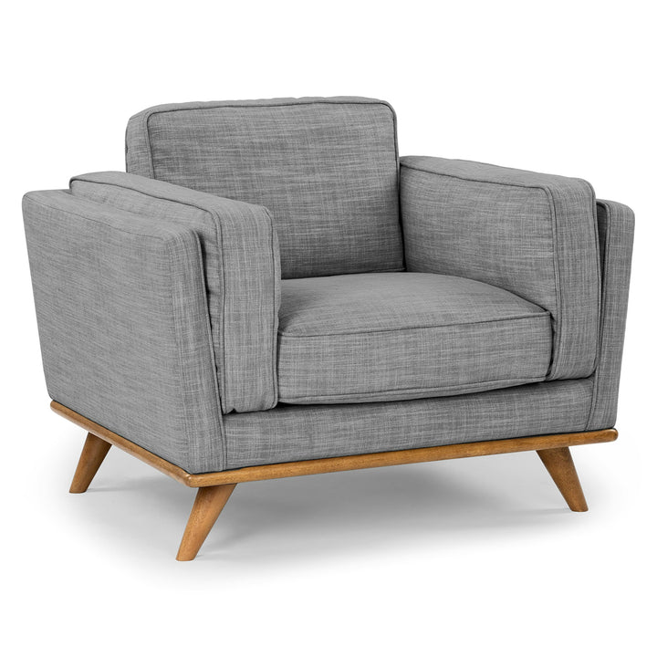 Ventura Lounge Chair in oat bouclé fabric with plush cushions, placed by a sunny window with coffee mug on side table