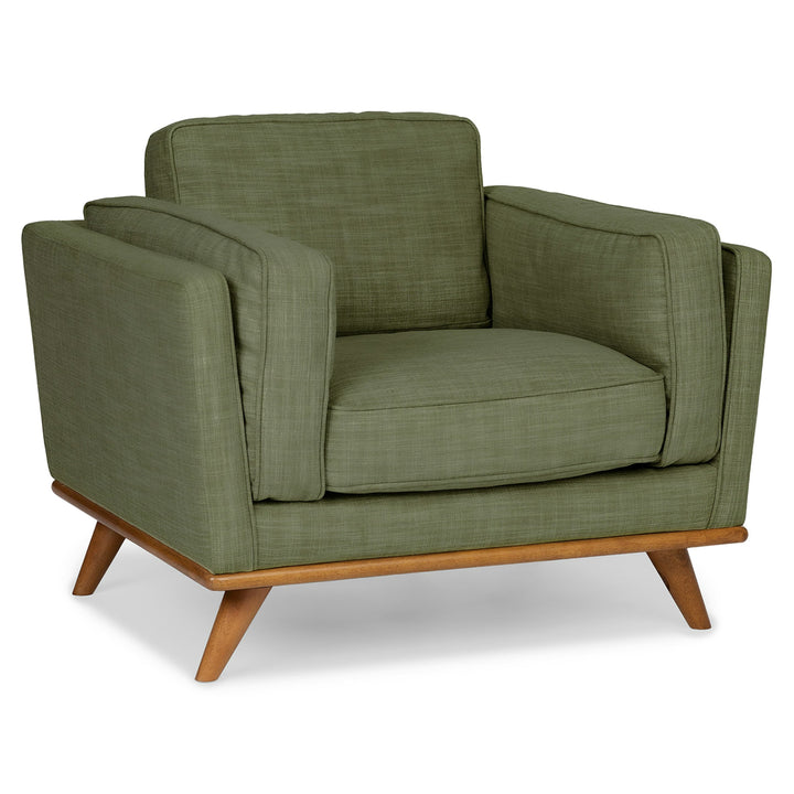 Ventura Lounge Chair in oat bouclé fabric with plush cushions, placed by a sunny window with coffee mug on side table
