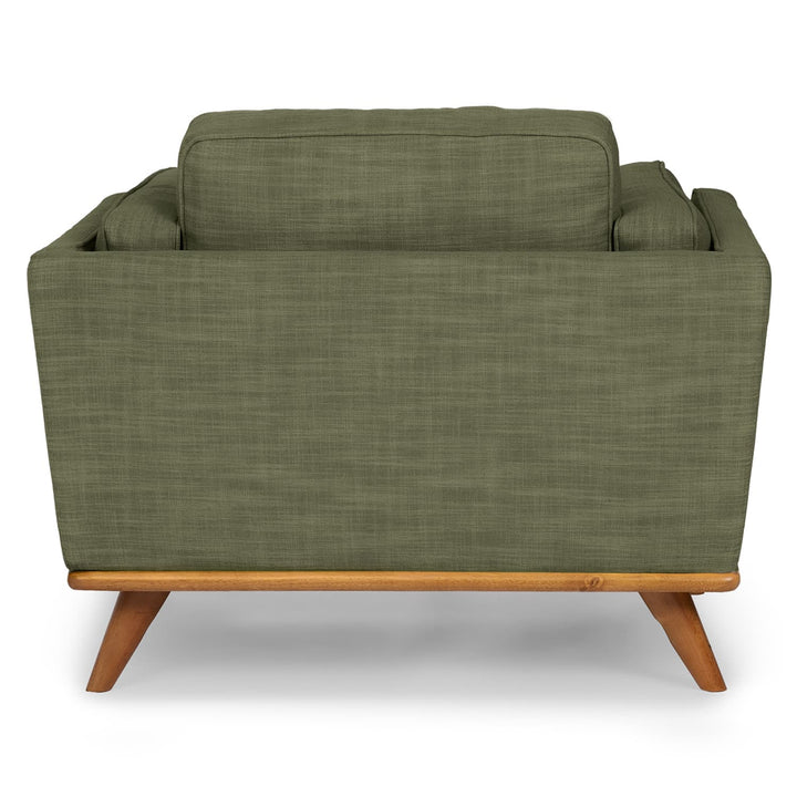 Ventura Lounge Chair in oat bouclé fabric with plush cushions, placed by a sunny window with coffee mug on side table