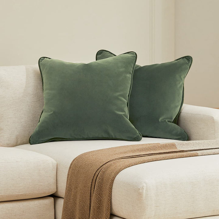 Vireo Velvet Pillow Set in a modern living room with plush velvet and piped edges