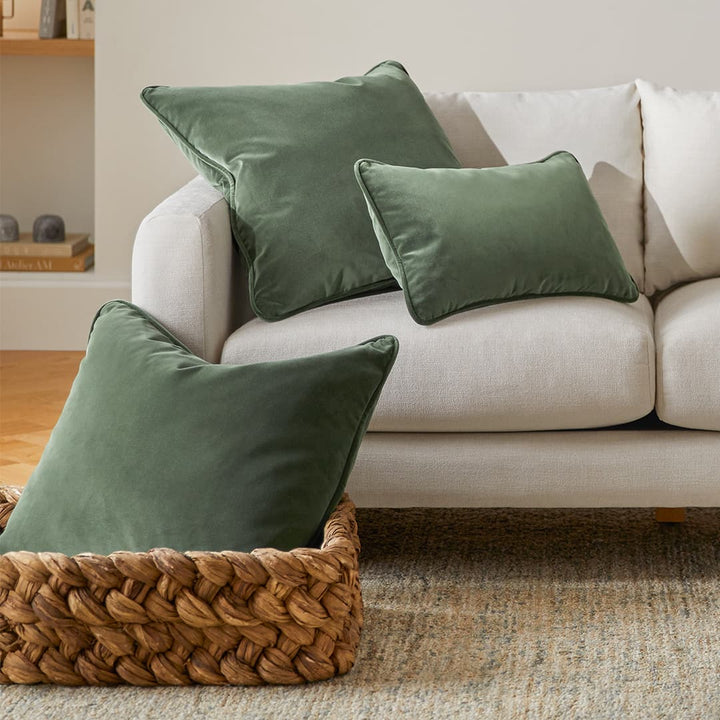 Vireo Velvet Pillow Set in a modern living room with plush velvet and piped edges
